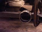 holes in tranny crossmember fro exhaust